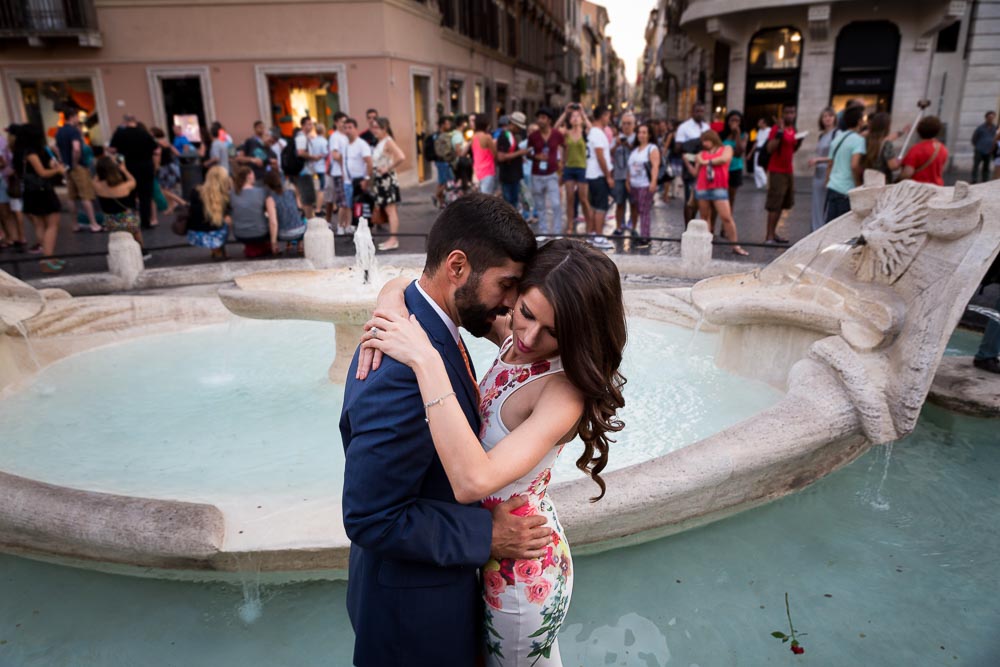 Romantic and in love imagery shot at the Barcaccia water fountain found at the bottom of the Spanish steps in Rome