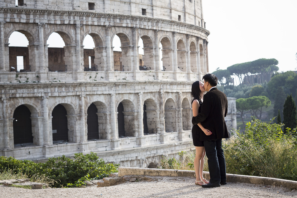 She said yes. Couple kissing in Rome 