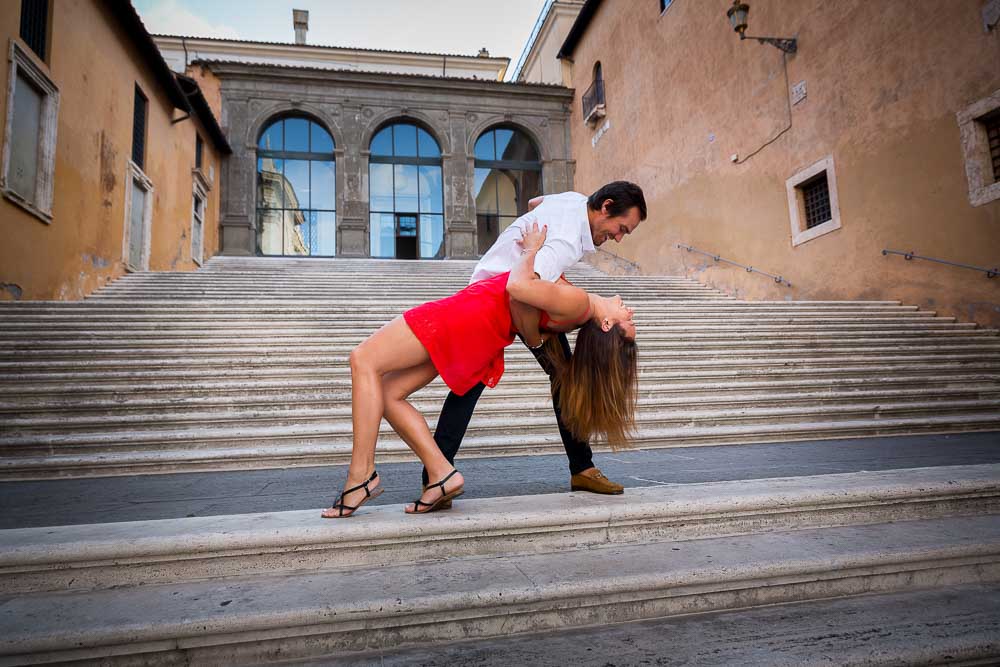 Man dipping woman during an e-session