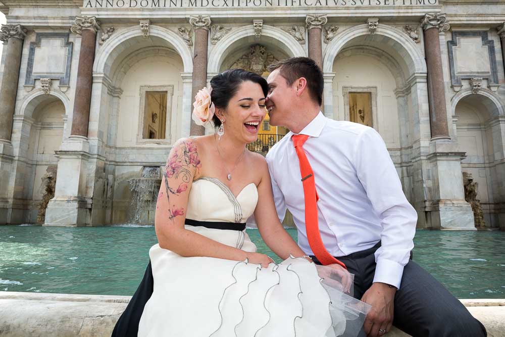 Happy together at a famous water fountain in Rome