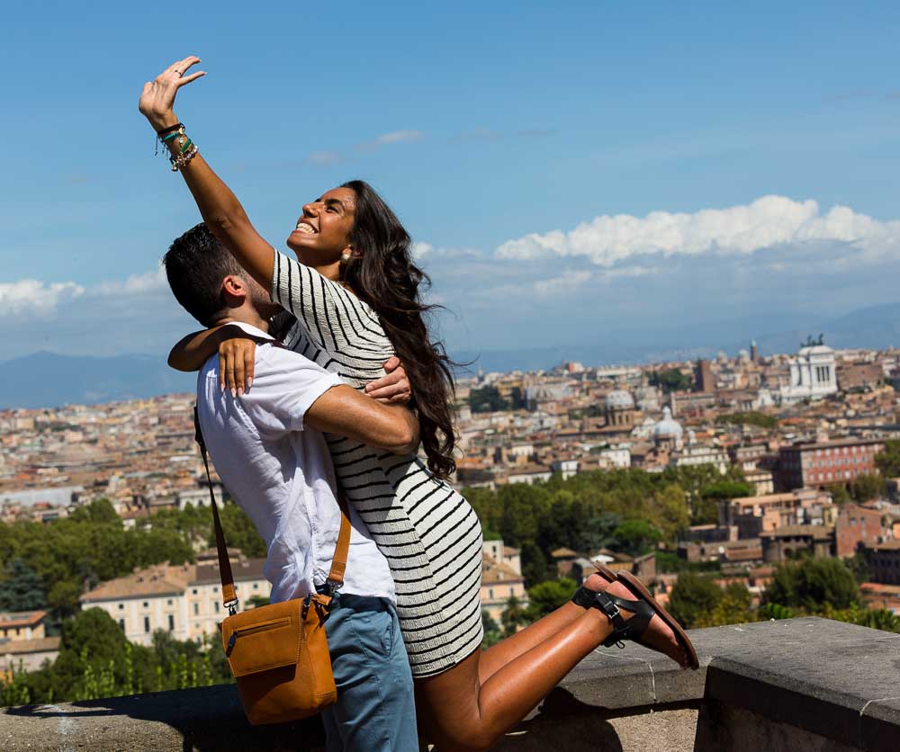 Piazza Garibaldi. Just engaged and happy throwing the engagement ring in the sky