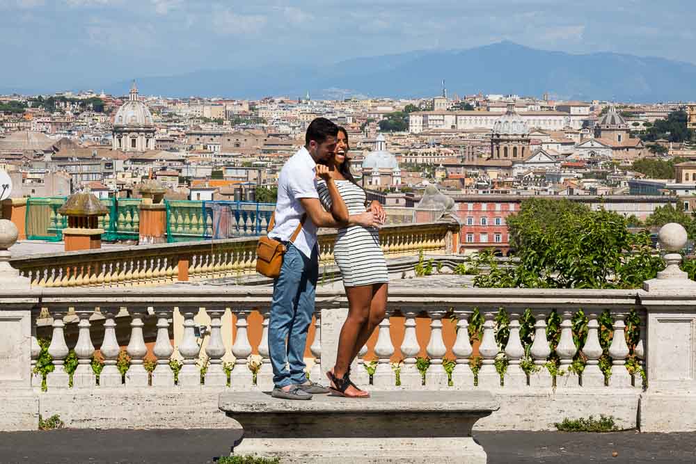 Posing overlooking the city of Rome during a photographer session