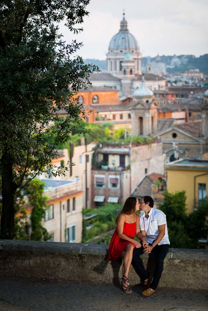 Romantic session overlooking the roman skyline at dusk