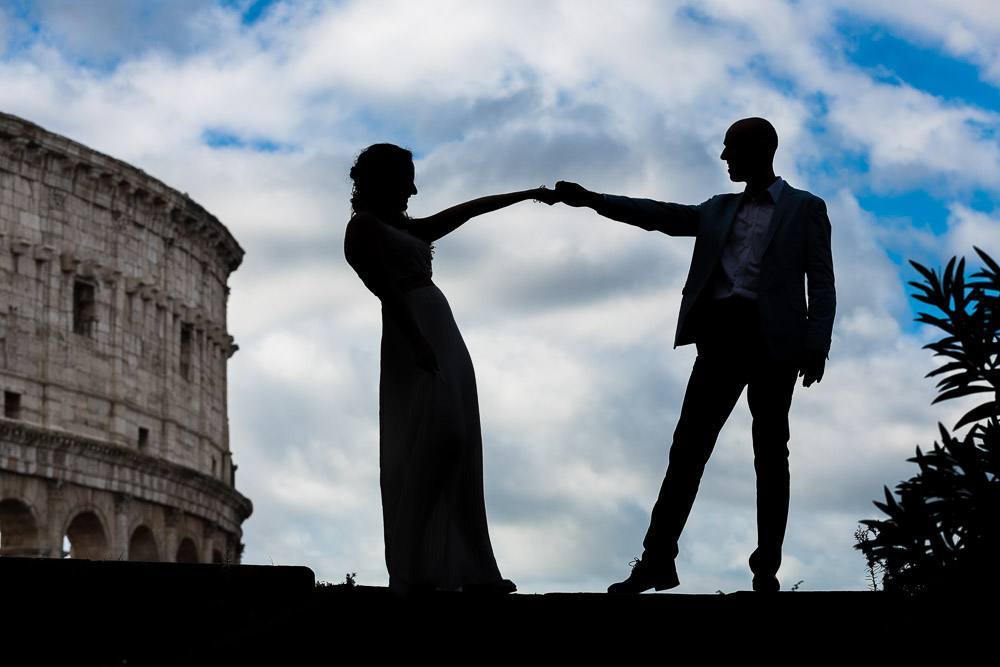 Silhouette image of a couple photographed at the Roman Colosseum during their wedding photos in Rome