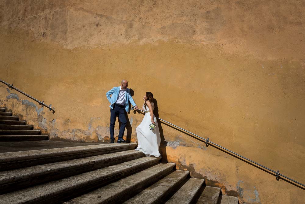 Newlyweds photographed on stairs