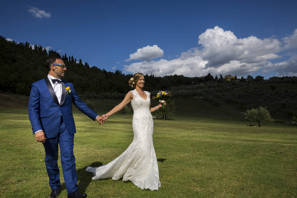 Just married in a Tuscan field. Wedding Photography Outside Florence