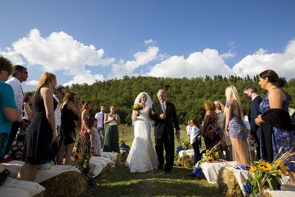 Wedding ceremony bride enters with her father