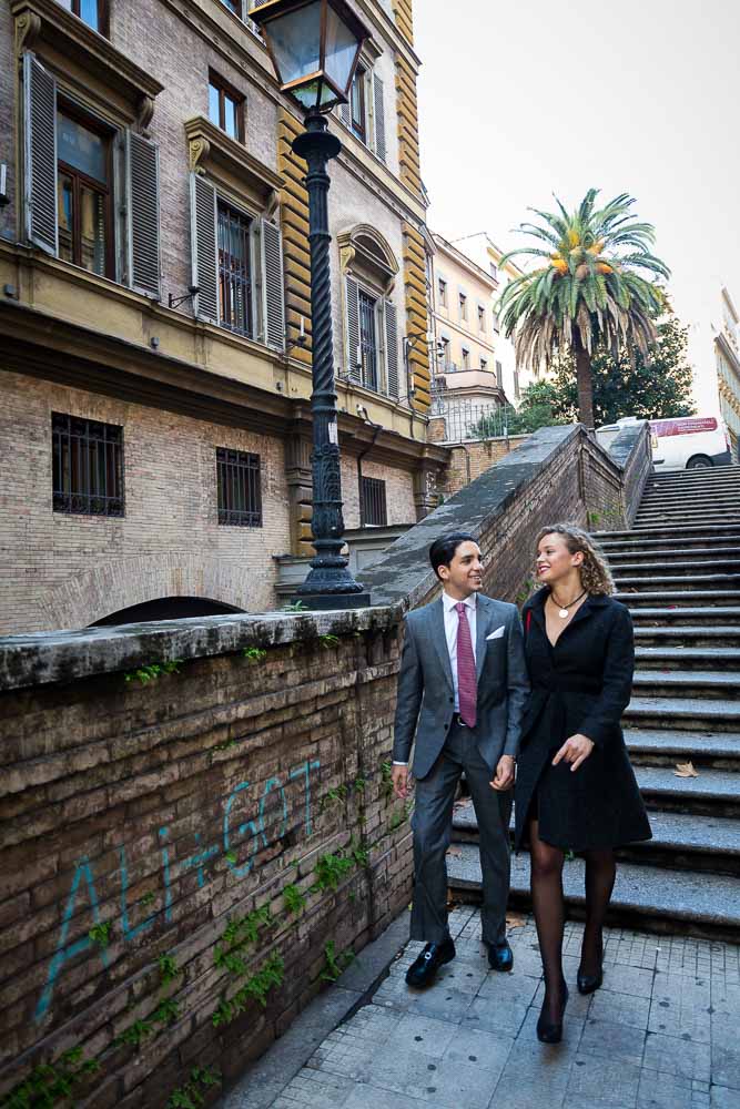 Couple walking together during a lifestyle photo session in the streets of Rome Italy