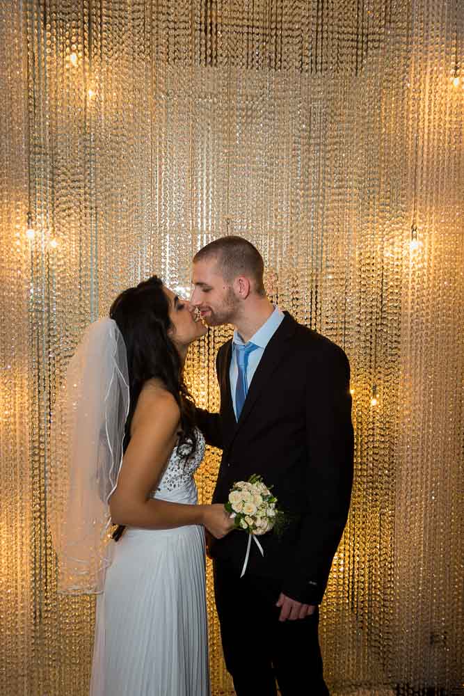 Newlyweds just married under light rain