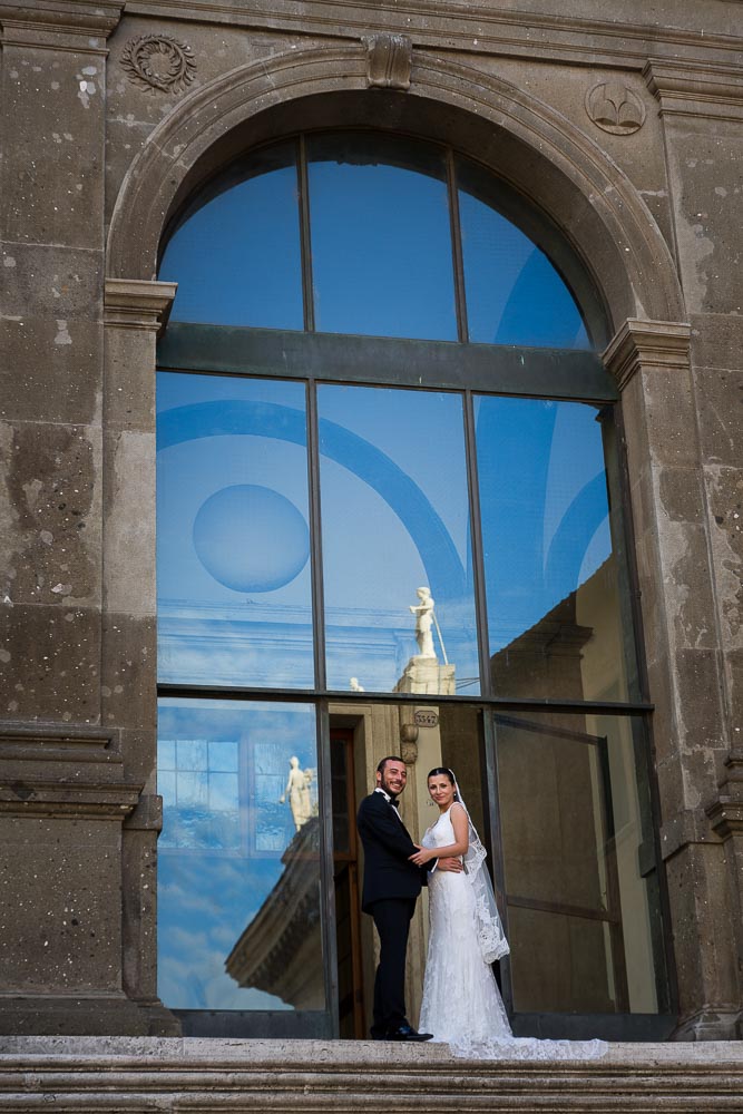 Standing at the entrance of the building on top of Piazza del Campidoglio