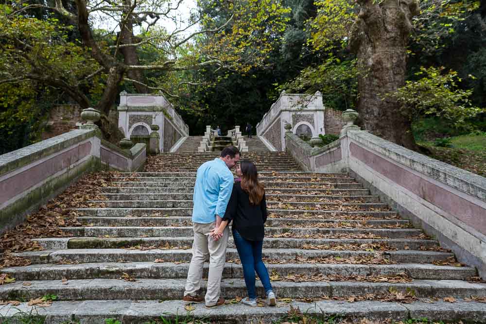 Autumn photo session. Posing on the stairs with leaves