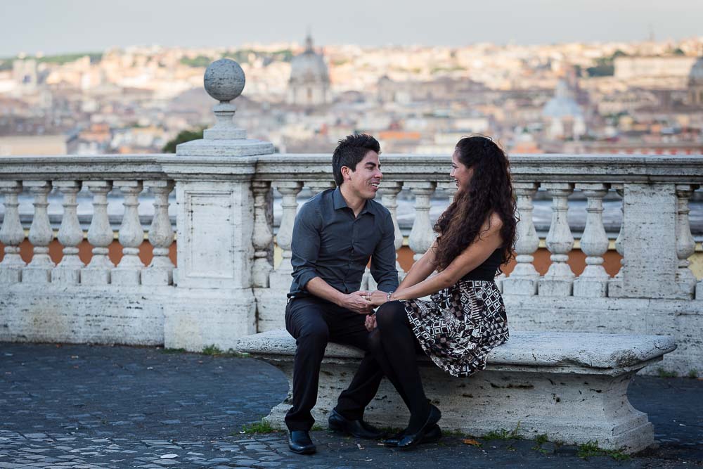 Together in Rome. Sitting down before the stunning view of the city from above.