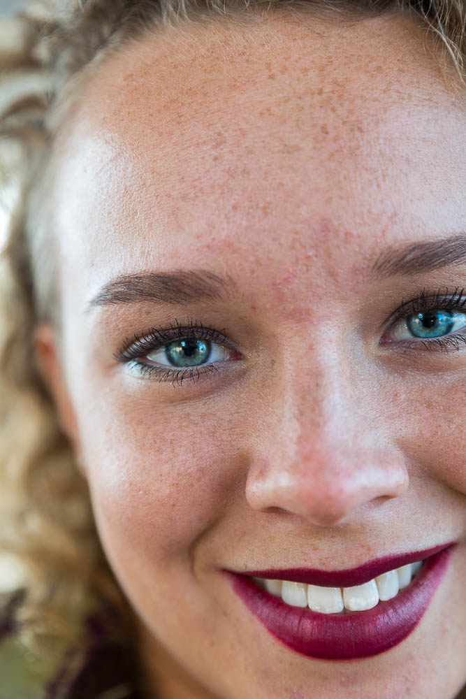 Woman close up portrait facial picture while smiling 