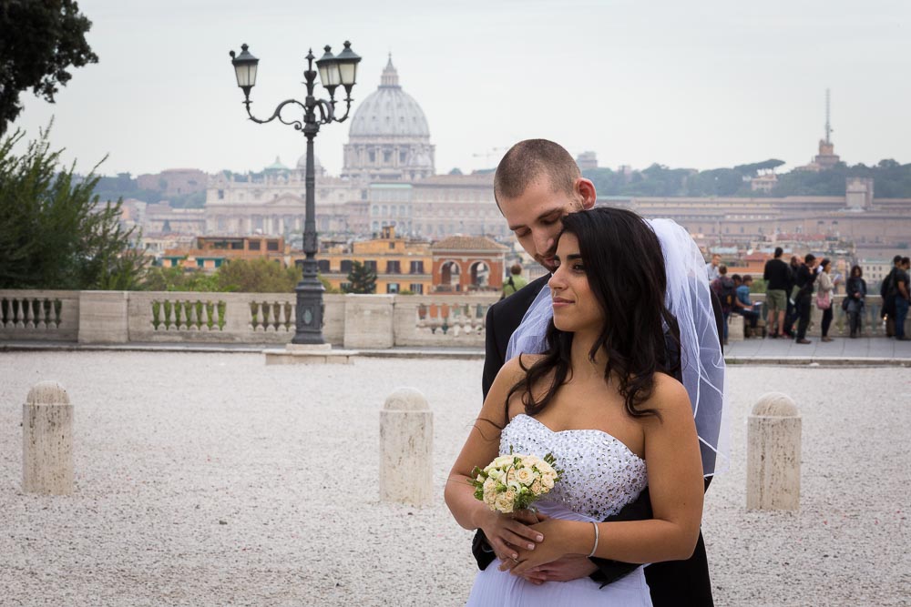 Portrait picture of bride and groom together before the roman scenery