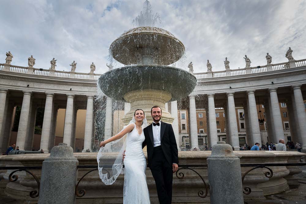 Posing in front of the fountain in San Pietro