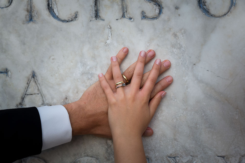 Wedding rings photo close up macro on marble