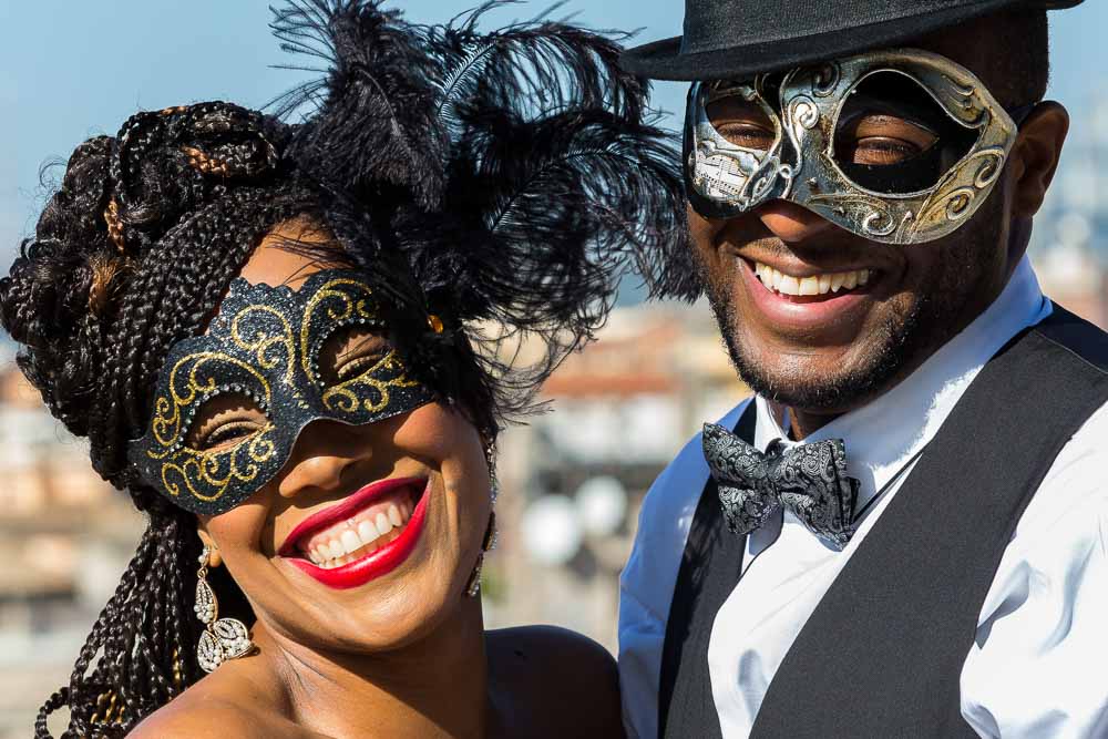 Venetian mask portraits. Close up images. Smiling and laughing.