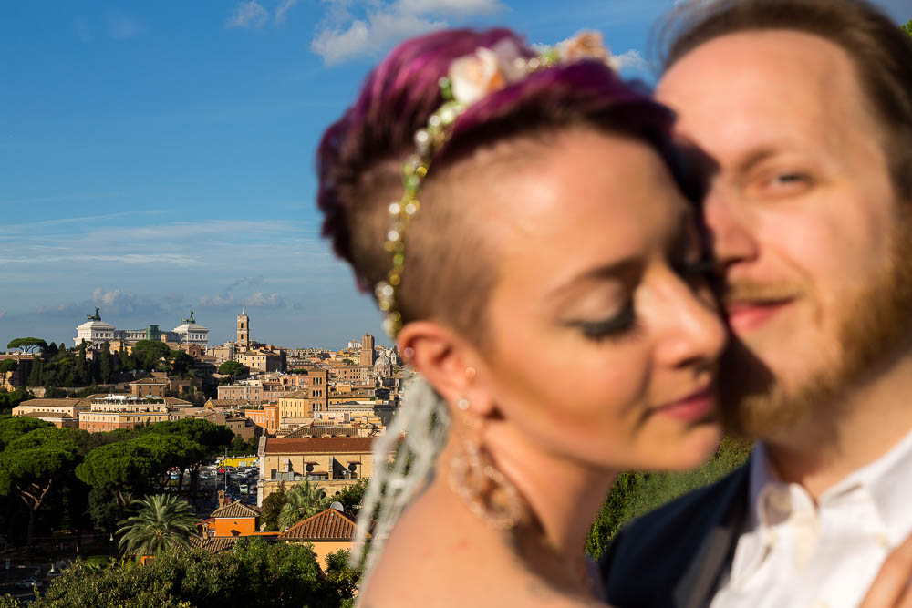 Married couple close up portrait overlooking the city of Rome Italy