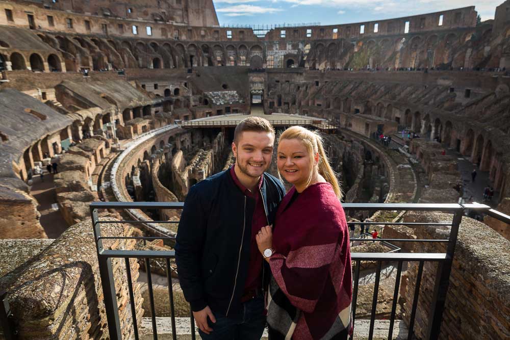 Portrait picture of a couple inside the Coliseum