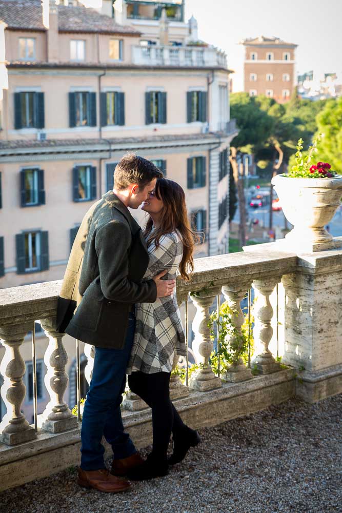 Kissing on a balcony in Rome