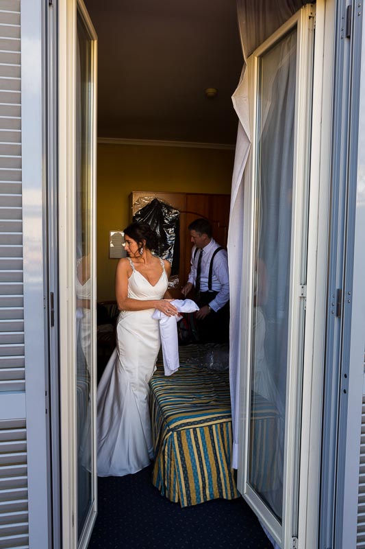 Bride through the window portrait