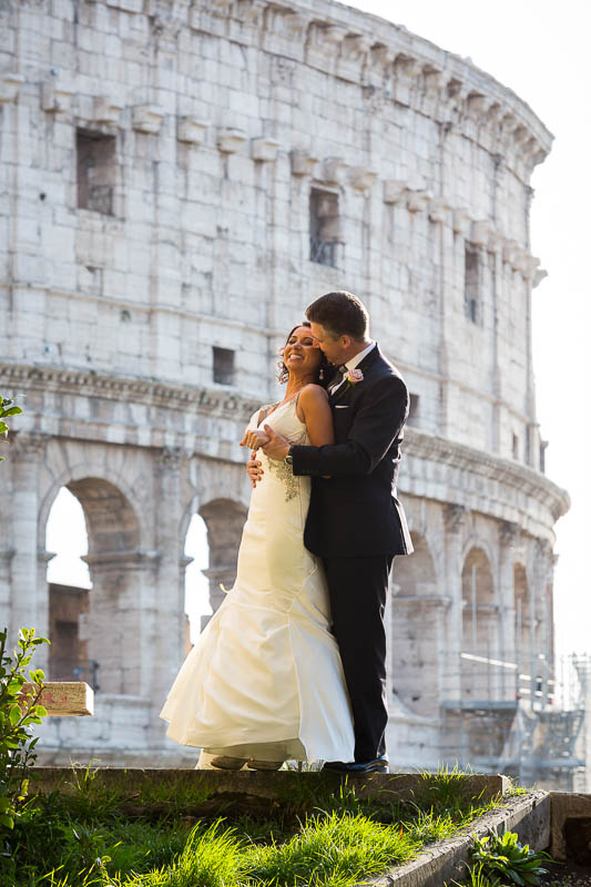 Bride and groom at the Roman Colosseum during their wedding photos