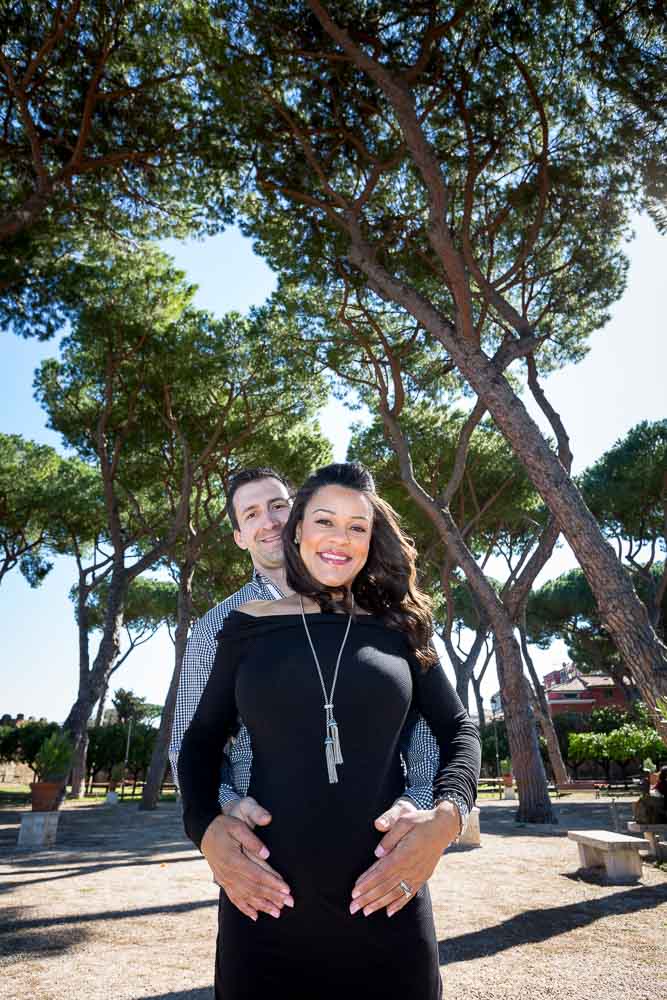 Posing picture in a park under pine trees