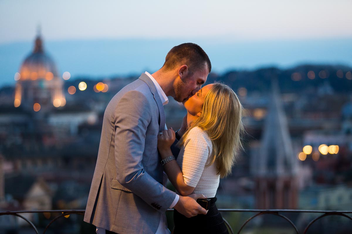 Romantic kiss at night in the roman streets