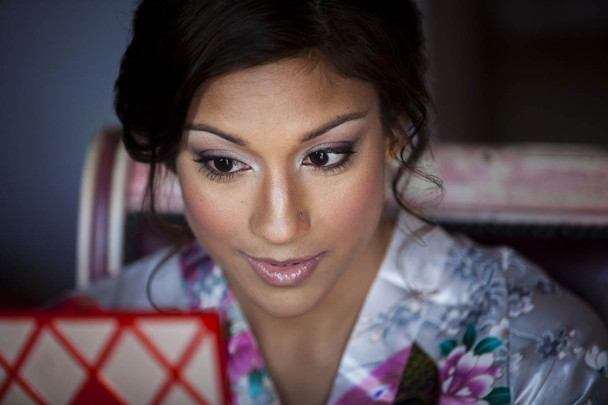 Bride getting ready picture looking into a mirror