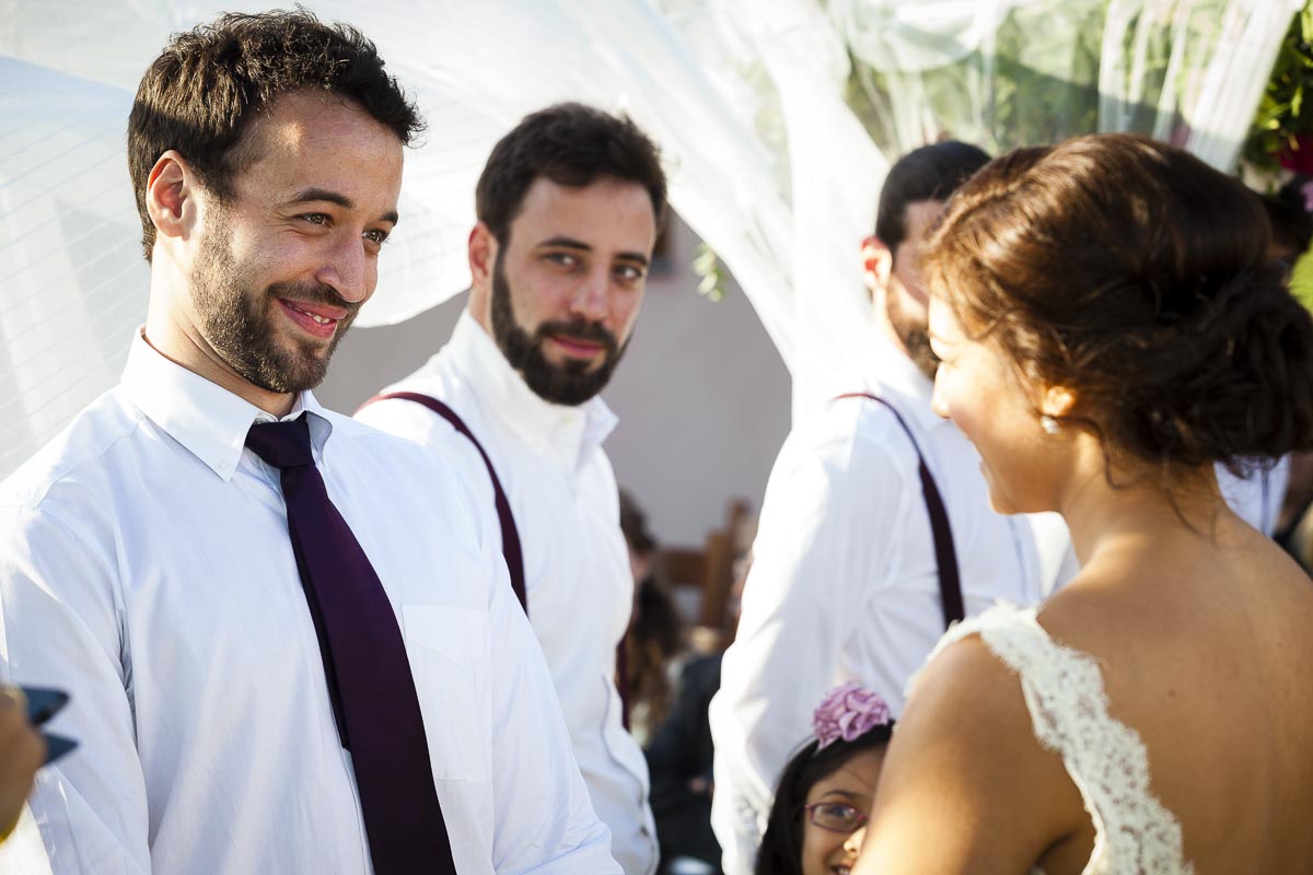 Bride and groom getting married by private outdoor marriage ceremony in Italy