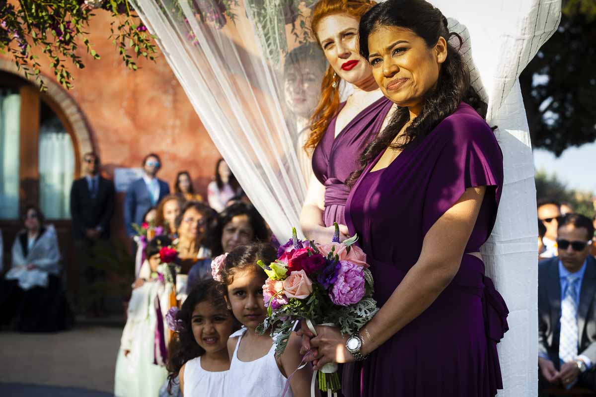 The bridal party photographed during the ceremony