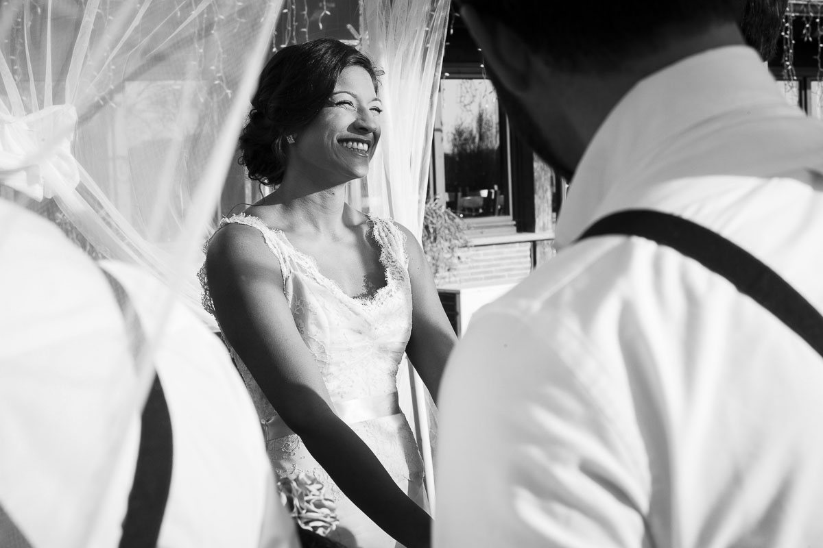 B&w image of a woman getting married