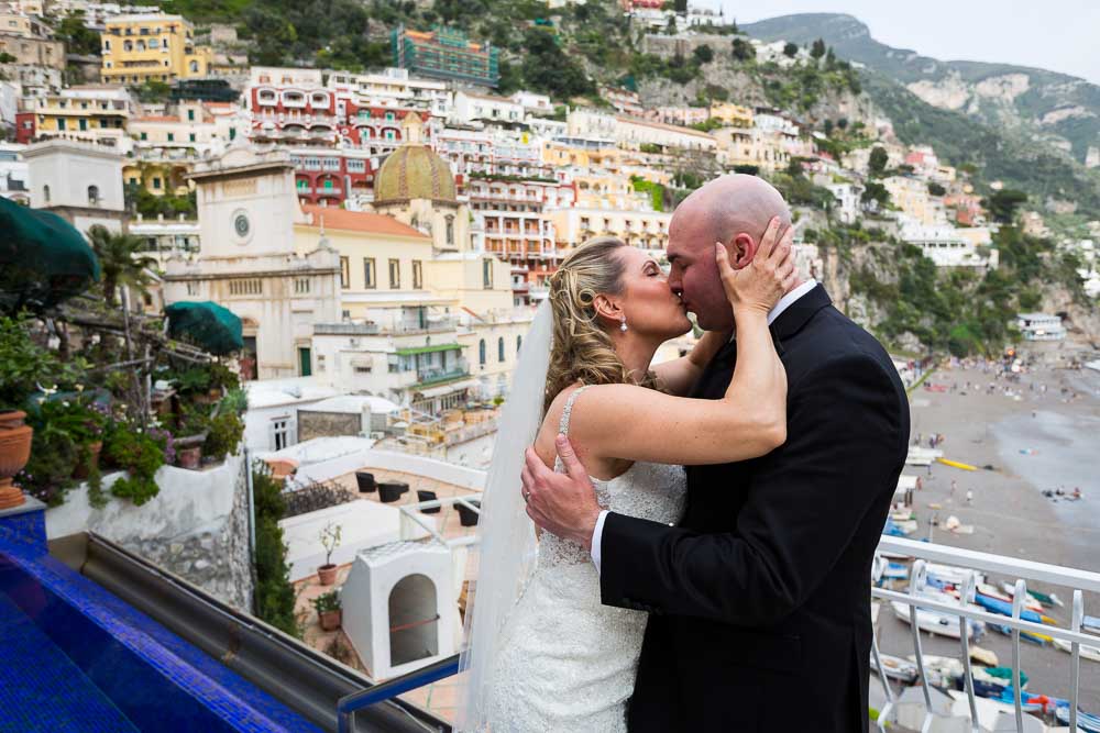 Wedding couple kissing in Positano Italy