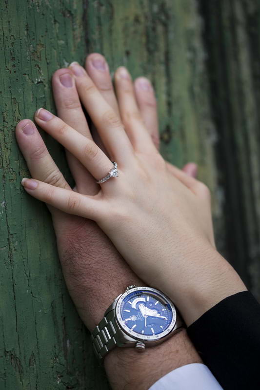 Holding hands together during an e-session