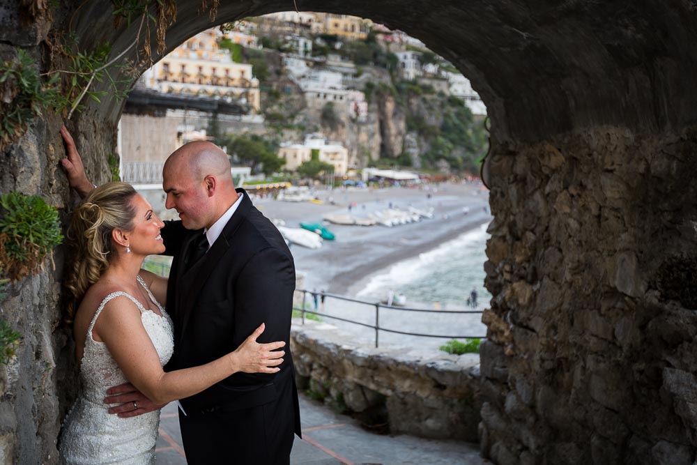 Couple portrait by the wall