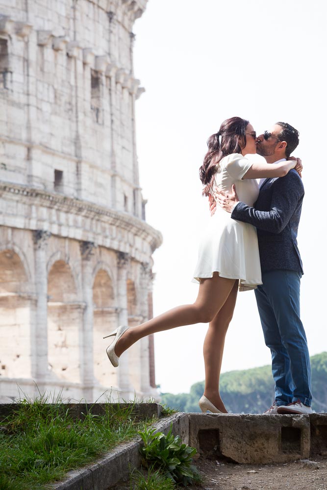 Man and woman posing at the Coliseum