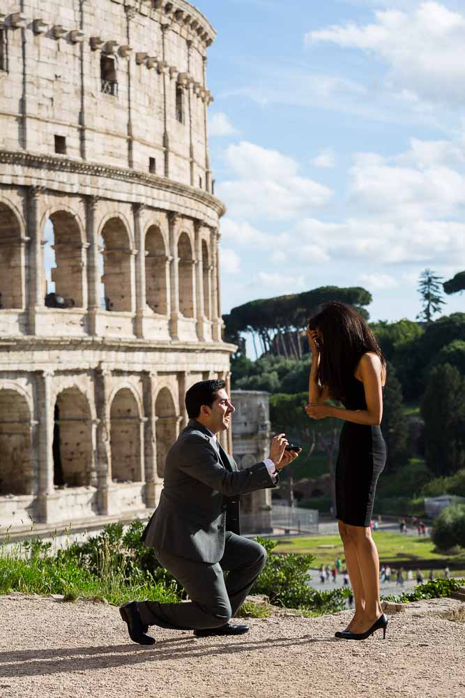 Man kneeling down for a wedding proposal at the Coliseum