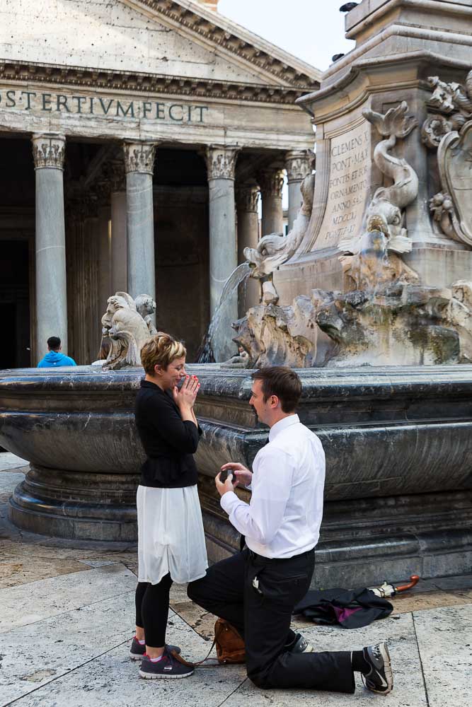 Wedding marriage proposal. Man proposing at the Pantheon in Rome Italy