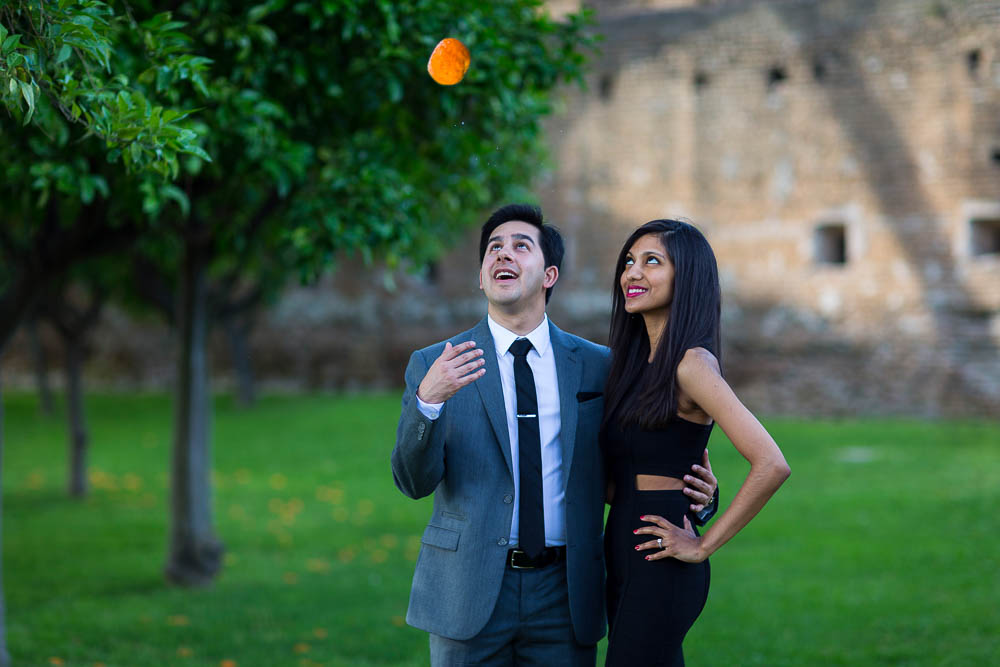 Throwing an orange in the air