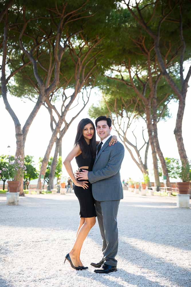 Posing under Mediterranean trees at the orange garden