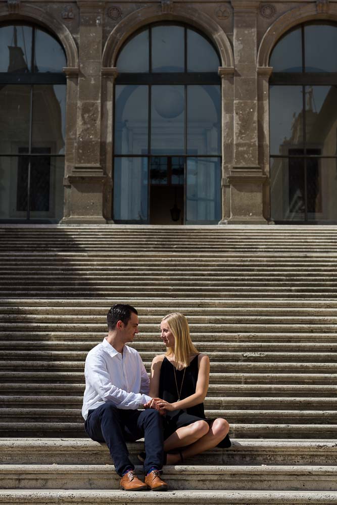 Engaged sitting down on a staircase