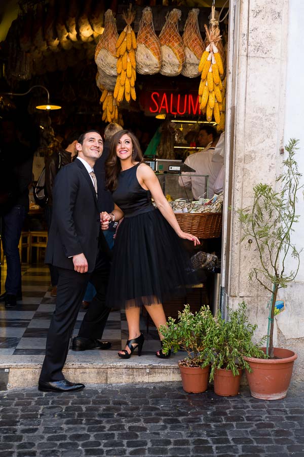 Standing at the entrance of an Italian grocery store