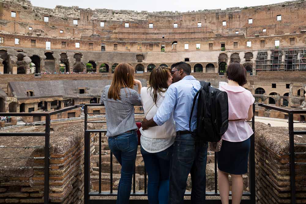 Couple in love inside the roman coliseum