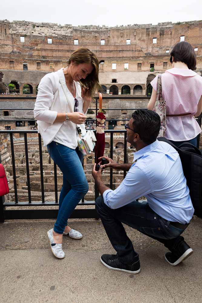 Knee down question will you marry me inside the roman Colosseum. Rome, Italy. Proposing at the Roman Colosseum