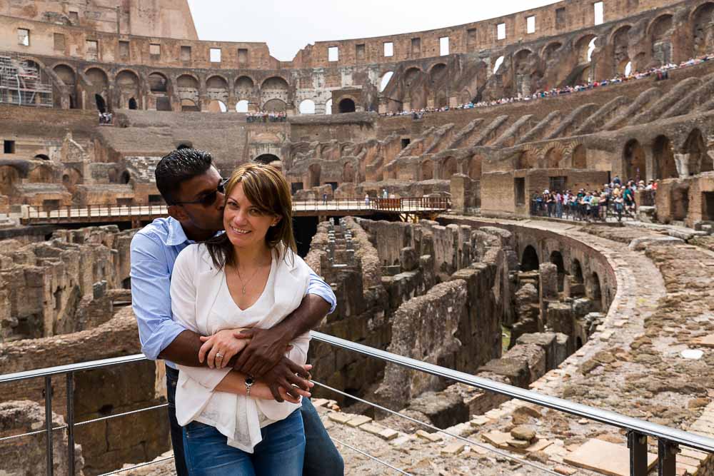 Just engaged picture portrait of a couple inside the Colosseum in Rome Italy