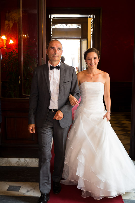 Bride entering Town Hall accompanied by father