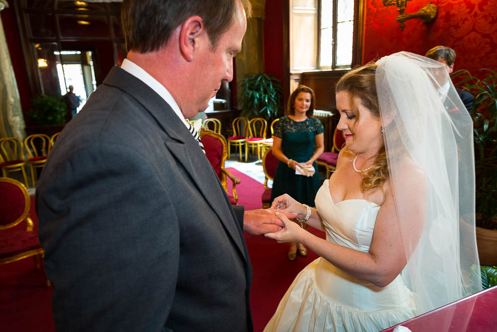 The exchange of the ring by the bride and groom during an Italian Campidoglio Town Hall Wedding Photography