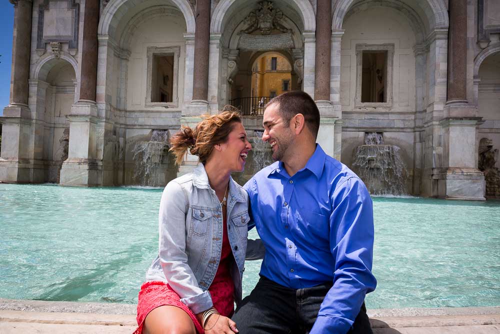 Engaged couple portrait at the Gianicolo water fountain