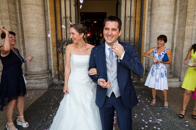 Walking outside during rice throwing by guests