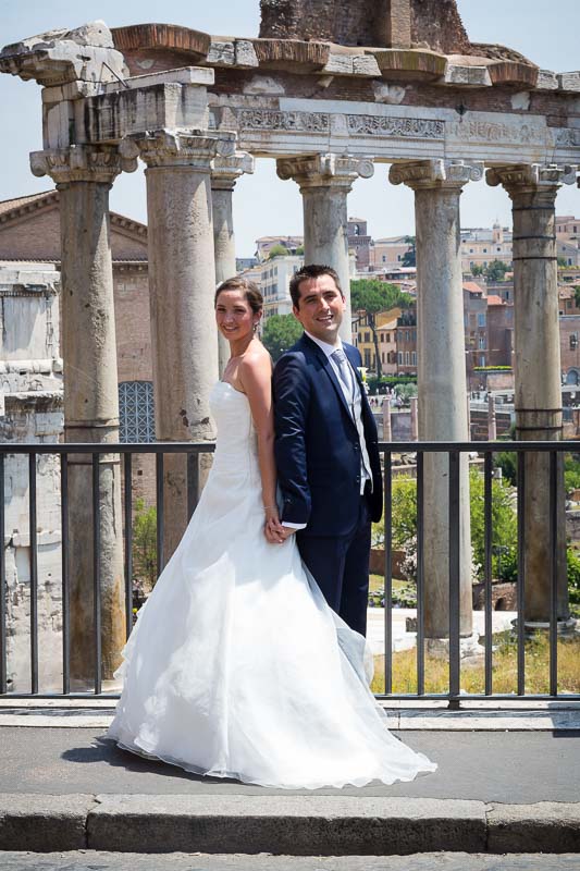 Newlywed portrait at the Roman Forum with ancient ruins in the background